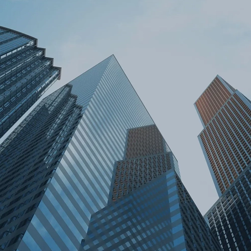 An image of buildings looking from the bottom up and at an angle.